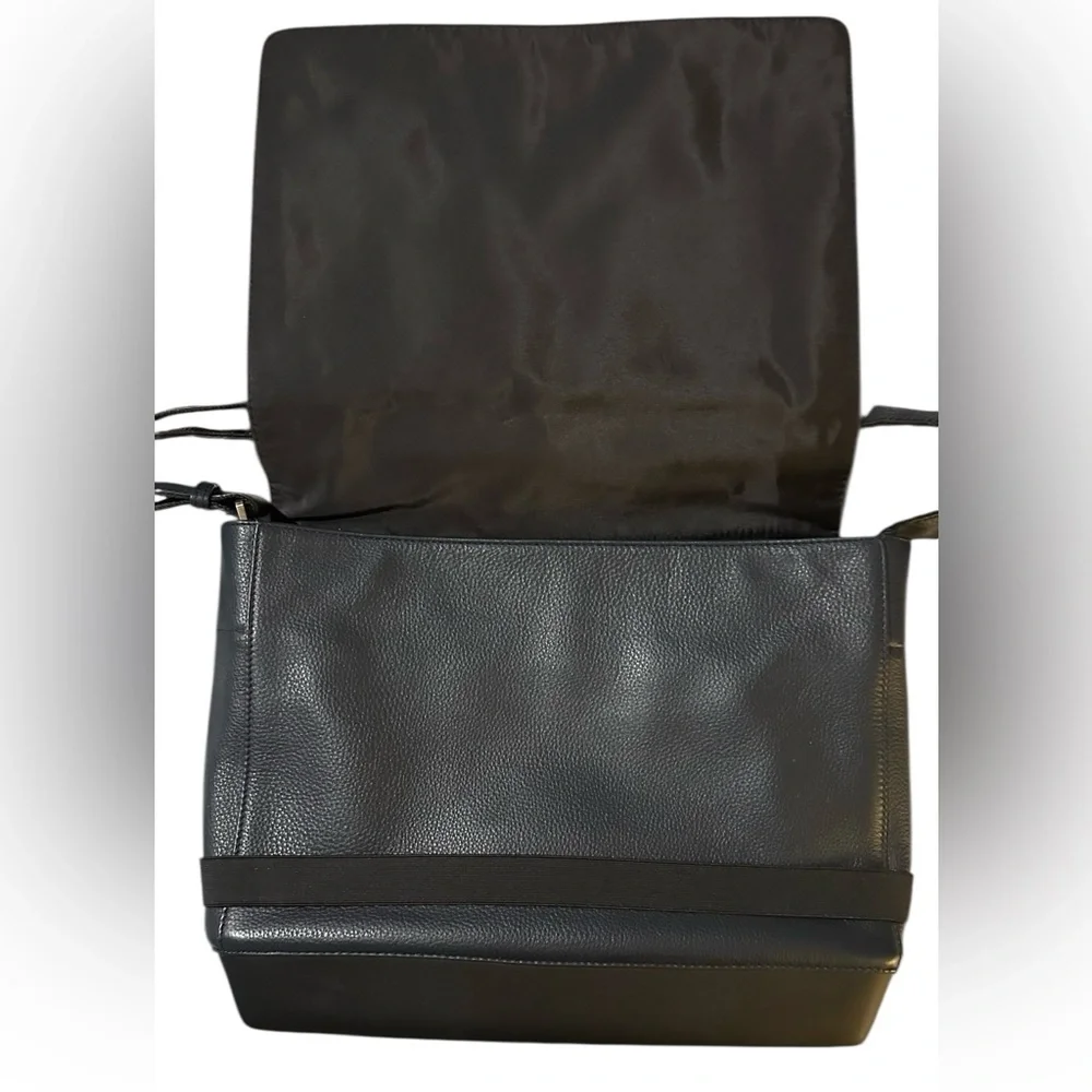 Moleskine Black Leather Laptop Bag w/ adj. waist strap.